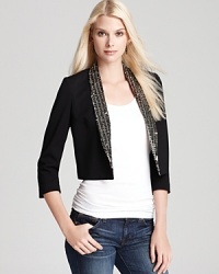 Shimmering sequins shine on the lapel of this ERIN Erin Fetherston jacket, crafted in a crop silhouette for a modern look.