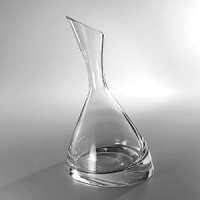 Nambé explores new ways to balance form and function. Our Tilt Decanter set sets the stage for elegant entertaining, or choose from a set of 4 double-old fashioned glasses. Both play with light, rounded forms and hard angles, creating shapes that grace your bar. Choose them for formal entertaining or for casual sipping-these glasses have a way of fitting in no matter what the mood.