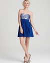 Sparkling sequins and gorgeous draping combine to create this fete-perfect strapless mini from Aqua.