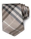 A signature check print tie from Burberry London, rendered in luxurious Italian silk for a stunning look and touch.