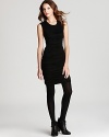 In light-as-air jersey, DKNY's ruched whisperweight dress lends a streamlined look.