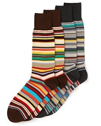 Brilliant multi colored stripes wrap around these socks, featuring a solid toe and heel.