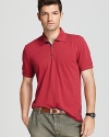 Contrast reinforced side vents and a rich red hue take the classic polo in a new direction.