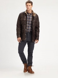 An effortless combination of luxury and warmth, this iconic utility jacket is lined with remarkably soft rabbit fur and accented with bellow pockets and zipper detailing.Zip frontSnap-button placketChest, waist flap pocketsAbout 30 from shoulder to hemLeatherDry cleanImportedFur origin: China