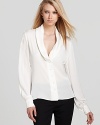 A wardrobe essential, this Rachel Zoe top in luxurious silk boasts a classic shawl collar for everyday chic.