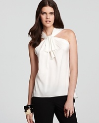 Make a dramatic entrance in this Elie Tahari blouse flaunting a decadent bow for an alluring, feminine style.