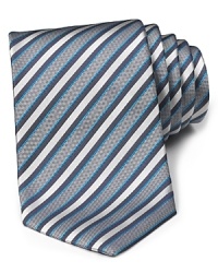 A handsome silk tie featuring a classic width and a smart multi-stripe pattern to offset your professional shirting.