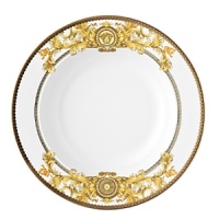 The most legendary figure of Asian mythology, the red dragon rises majestically from this fabulously opulent dinnerware from Rosenthal Meets Versace, conveying all its might and glory. Each piece features ornate golden baroque patterns and four small medallions representing the sun, and the Versace medusa decorates the background.