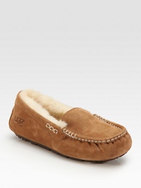 Decorative stitching and plush shearling lining enhance this moccasin-inspired suede design. Stretch suede upper Shearling lining Rubber sole Padded insole ImportedOUR FIT MODEL RECOMMENDS ordering true whole size; ½ sizes should order the next whole size down. 