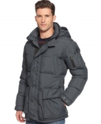 A down jacket with the grown-up good looks you don't get from those big shapeless numbers in a sporting goods store: Quilted puffer coat with wind-cheating double front closures and removable hood lined in faux fur, from Armani Jeans.