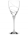 A fanciful cut pattern contrasts the timeless form of this Adorn goblet from the Lenox crystal stemware collection.