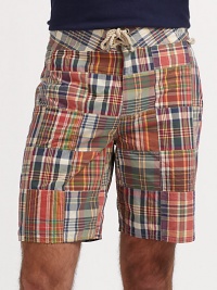 An allover patchwork design is highlighted by handsome plaid patterns on this preppy, classic-fitting swim trunk.Drawstring tie waistZip flySide slash, back patch pocketsInseam, about 8½52% cotton/48% nylonMachine washImported