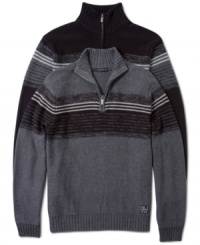 Just when the chill starts to set in, this 1/4 top zip long sleeve pullover sweater by Calvin Klein Jeans is the ideal sweater to wear over layers.