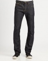 Raw indigo-rinsed denim classic in a slim-leg silhouette, with folded back pocket detailing and enlarged, logo-branded button shanks.Five-pocket styleButton flyInseam, about 35CottonMachine washImported