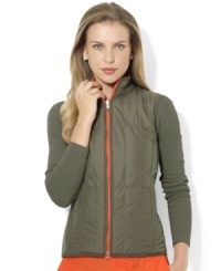 Lauren Ralph Lauren's chic quilted vest is crafted in sleek microfiber and reverses between two bold colored sides for easy athletic styling options. (Clearance)