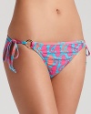 Sandy seahorses take form in saturated hues on Lilly Pulitzer's playful bikini bottom.