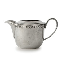 In a nod toward old-world inspiration, talented Italian artisans carefully craft this Arte Italica creamer by hand from the highest-quality pewter and glass. It's enhanced with a delicate pattern reminiscent of vintage lace.