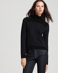 A blue and black zigzag pattern defines this rich Theory turtleneck sweater for a fresh off-duty look to update seasonal staples.