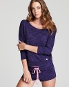 Sporty yet chic, Juicy Couture's dolman-sleeve pullover will become your new go-to for lounging around.