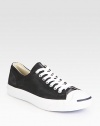 Two-tone lace-up favorite in stretchy canvas with a rubber sole for extra traction. Padded insoleRubber soleImported