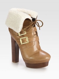 Plush shearling softens this leather silhouette with goldtone hardware, thin laces and a towering stacked heel. Stacked heel, 5 (125mm)Stacked island platform, 1½ (40mm)Compares to a 3½ heel (90mm)Leather and shearling upperAdjustable buckle strapsLeather lining and solePadded insoleImported