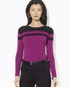 A soft ribbed top is crafted with bold color-blocking to create a sleek, modern look.