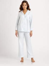 Subtle touches of tone-on-tone embroidery add a feminine edge to these classic pajamas, tailored in the softest brushed cotton flannel.Notched collarButton frontChest pocketLong sleevesEmbroidered details on cuffs and pocketElastic waist pantsInseam, about 29CottonMachine washImported