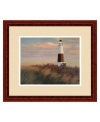 Brighten your beach home with Ray of Light by Diane Romanello. A charming lighthouse leads the way through a sea of tall grasses under the warm, peachy rays of a setting sun. A polished cherry frame adds an element of timeless refinement.