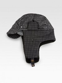 Mixed check trapper hat with soft brim and faux Sherpa lining.One size fits mostAcrylicDry cleanImported