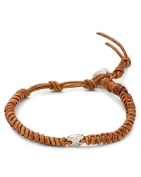 Rugged leather is offset by a flash of sterling silver for an ultra-cool bracelet that supports your masculine edge.