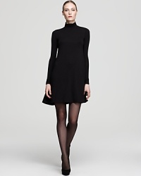 Primed for fall, this classic turtleneck dress has a flattering flare silhouette for easy-to-wear daytime style.