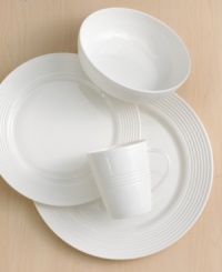 Find style and substance in the Tin Can Alley accent plate. Concentric grooves – four degrees – give the Lenox dinnerware its edge in versatile white bone china.