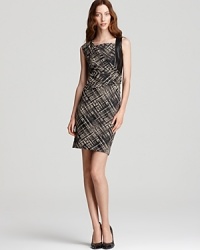 Trade your LBD for something unexpected with this Lafayette 148 New York dress. A graphic print emboldens an artfully draped silhouette, punctuated with leather insets for serious fashion presence.