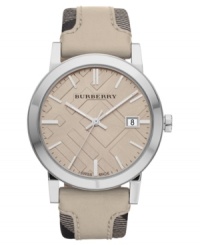 Neutral chic mixed with check patterns: a stylish and precise Burberry timepiece.