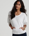 Classic stripes lend undeniable charm to this Sam & Lavi top, complete with kangaroo pocket.