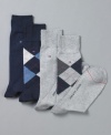 Classic argyle socks from Tommy Hilfiger strike a sophisticated note with any dress shoe.