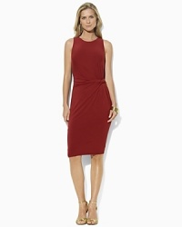 Rendered in slinky stretch jersey for a curve-conscious fit, this dress puts a chic spin on the classic sheath dress with an elegant twist detail at the hip.