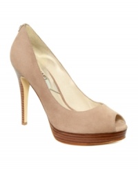 A most classy neutral. MICHAEL by Michael Kors' York platform pumps will fit in splendidly with most any look, be it day or night.