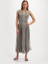 Airy silk chiffon in graphic window checks, is trimmed with ruffles for an ultra femme design.Ruffled collar Sleeveless with ruffle trim Ruffled front button placket Seamed waist Ruffled hem Contrast rayon camisole dress About 50 from shoulder to hem Silk; dry clean Made in Italy