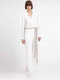 Look simply chic in this floor-sweeping minimalist jumpsuit, with a braided belt for a casual-cool effect. Shirt collarDropped shouldersLong sleeves with button cuffsButton-down front with hidden placketShirred bodiceBanded waist with belt loops and removable braided beltFront slash pocketsInseam, about 39Rise, about 11ViscoseDry cleanImportedModel shown is 5'10.5 (179cm) wearing US size 4.