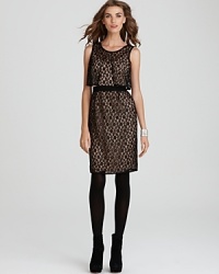 Ladylike lace gets a modern update from cool cut-out detail at the waist of this MARC BY MARC JACOBS dress. The perfect party look for fall, this chic silhouette is complete with platform sandals and a touch of gilded accents.