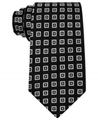 Set the pattern of bold business style on repeat with this geometric silk tie from Donald J. Trump.