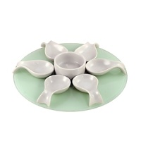 Perfect for presenting tasty bites of mise en bouche, favorite appetizers or sweet treats, 10 Strawberry Street's set includes six porcelain tasting spoons, one sauce dish and a glass tray with lazy Susan.