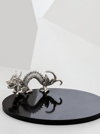 A playful aluminium dragon sculpture lends a touch of Eastern elegance to this marble serving board.Included bamboo/cashmere gift bag14 diam.Marble and aluminiumWipe clean with a soft clothImported