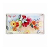 The rich floral colors on this glass tray from Fringe will add a warm glow to your home decor.