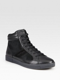 Be one step ahead of the style game in these high-top sneakers featuring a smooth leather upper with a haircalf panel design and lace-up front.Leather/haircalf upperLeather liningPadded insoleRubber soleMade in Italy