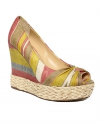 A touch of retro gold, these Goldie wedges from Report bring hippie-chic with espadrille detail and a colorful fabric finish. Pair with a floral sundress for instant style.