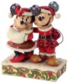 Old Saint Mick! Dressed up in a folksy take on Santa's red suit, Mickey celebrates the joy and jubilation of Christmas with his Mrs. Claus. Mickey's and Minnie's signature mouse ears get a glimmering, eye-catching update that plays with the whimsical shapes & designs on this figurine.