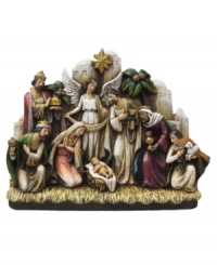 Mary and Joseph, the three magi, a shepherd, and an angel stand watch over the newborn in a traditional nativity scene. Artfully hand painted on resin, this Napco collectible figurine will serve as a reminder of the true meaning of Christmas.