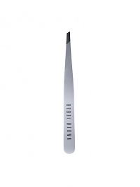 Keep brows groomed with this deluxe tweezer, crafted by Rubis of Switzerland. In stainless steel, this slant-tip instrument is considered the finest on the market. Comes with a rubber cap to protect the precision tip. 